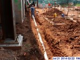 Installing the underground plumbing between column lines 3-3.5 from C-E. Facing West (800x600).jpg